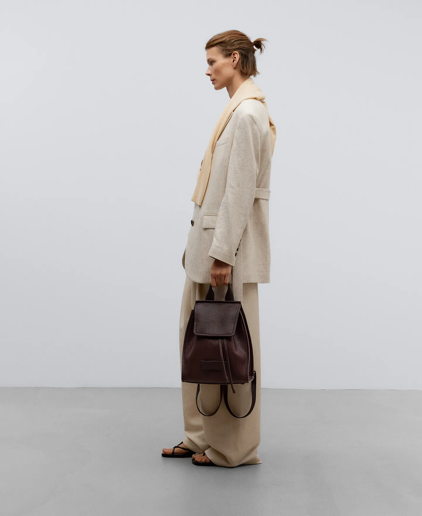 Brown recycled material backpack woman